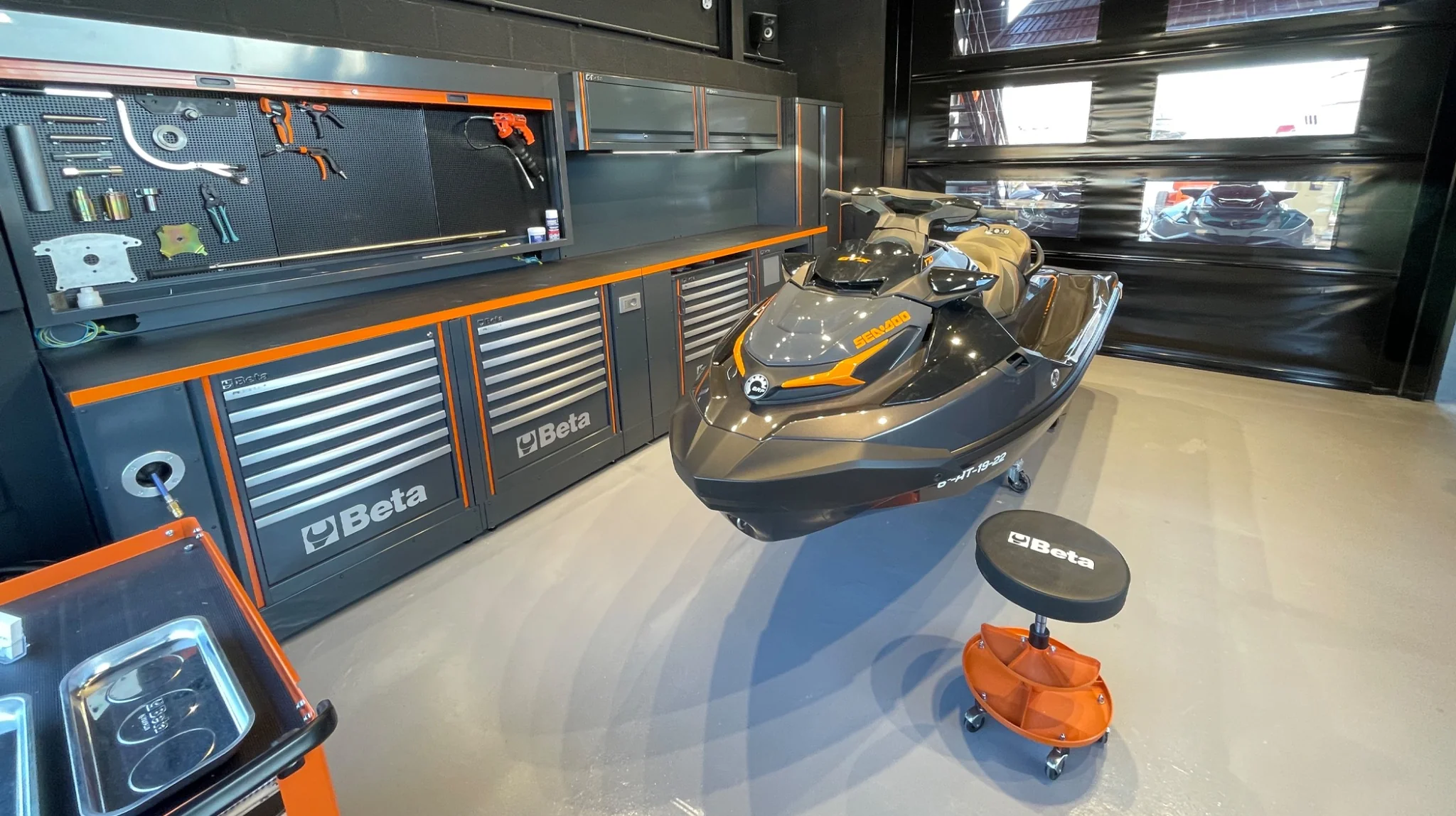 Sea-Doo jet ski inside professional maintenance workshop at jetski.club Ibiza